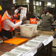 Election officials count ballot papers at a voting station in Lusaka, Zambia Jan. 20, 2015.